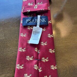 Three new Jos A Banks ties--never worn.